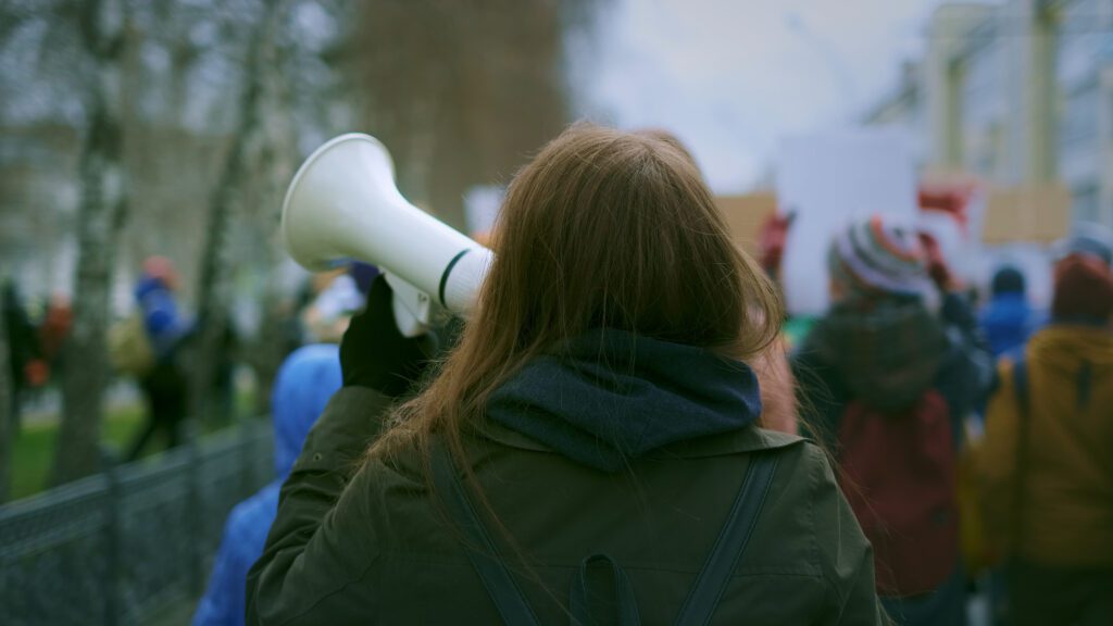 Activist speaking during outdoor protest
