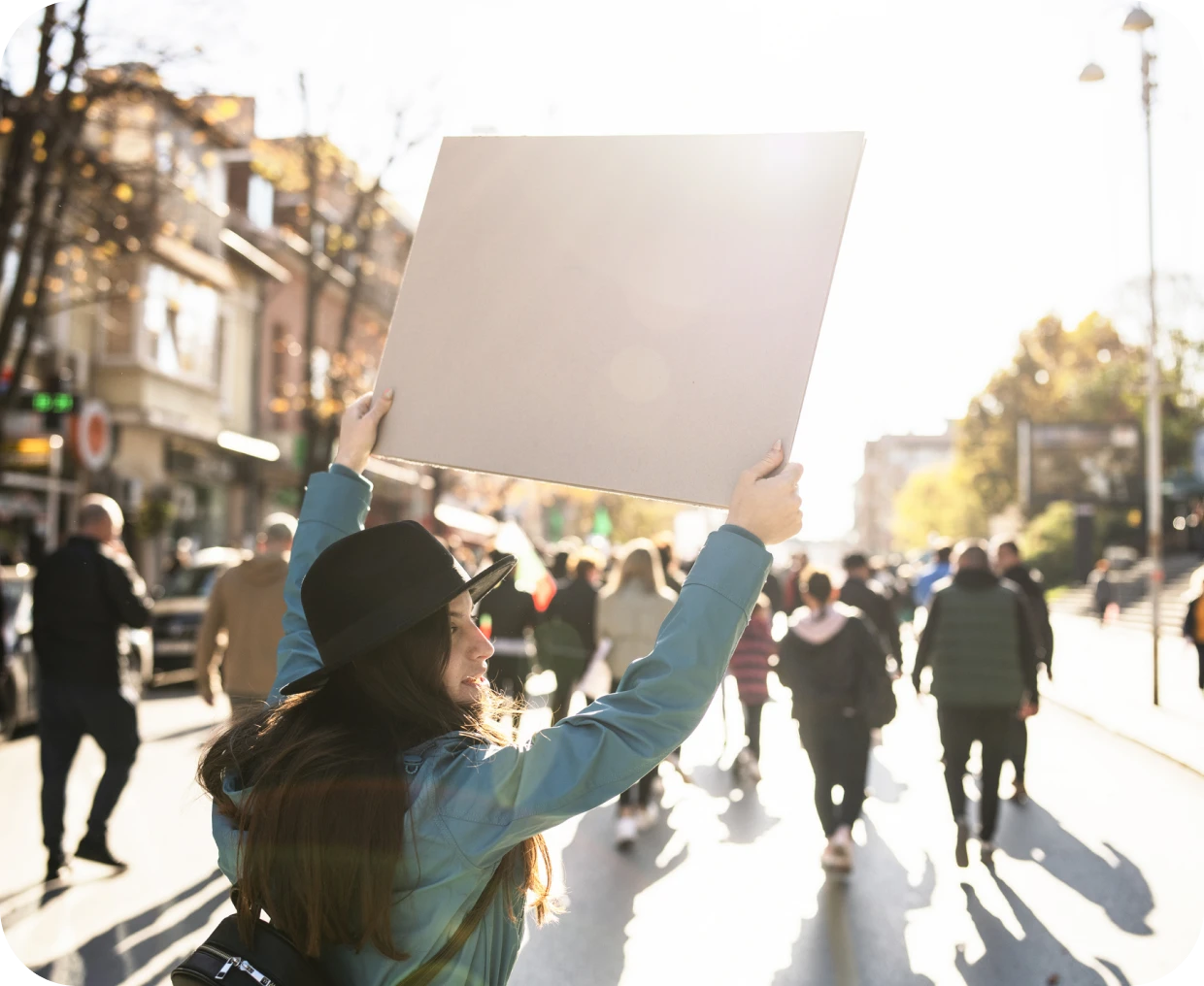 Demonstration with person carrying empty placard